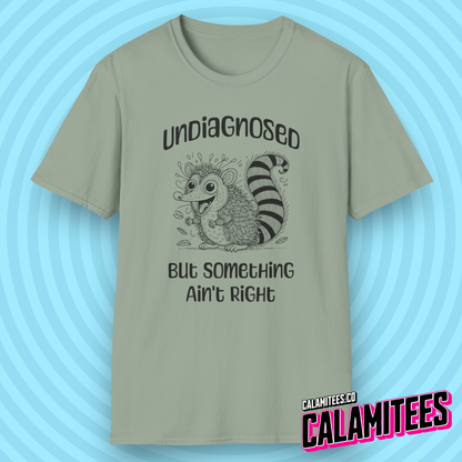 Undiagnosed But Something Ain't Right Funny Crazy Possum Opossum Raccoon Rodent Graphic Tee Sarcastic Humor T-Shirt CALAMITEES.co CalamiTees Shirt